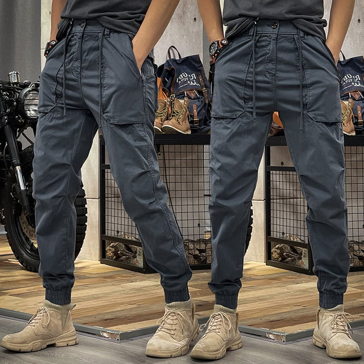 Men's stylish multipocket cargo pants with a relaxed fit, lightweight fabric, and versatile design perfect for summer days and outdoor activities.






