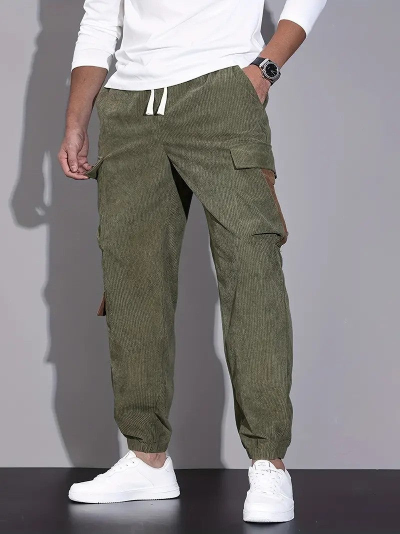 Modern corduroy cargo pants with a relaxed fit, spacious pockets, and breathable material, perfect for casual and outdoor activities.