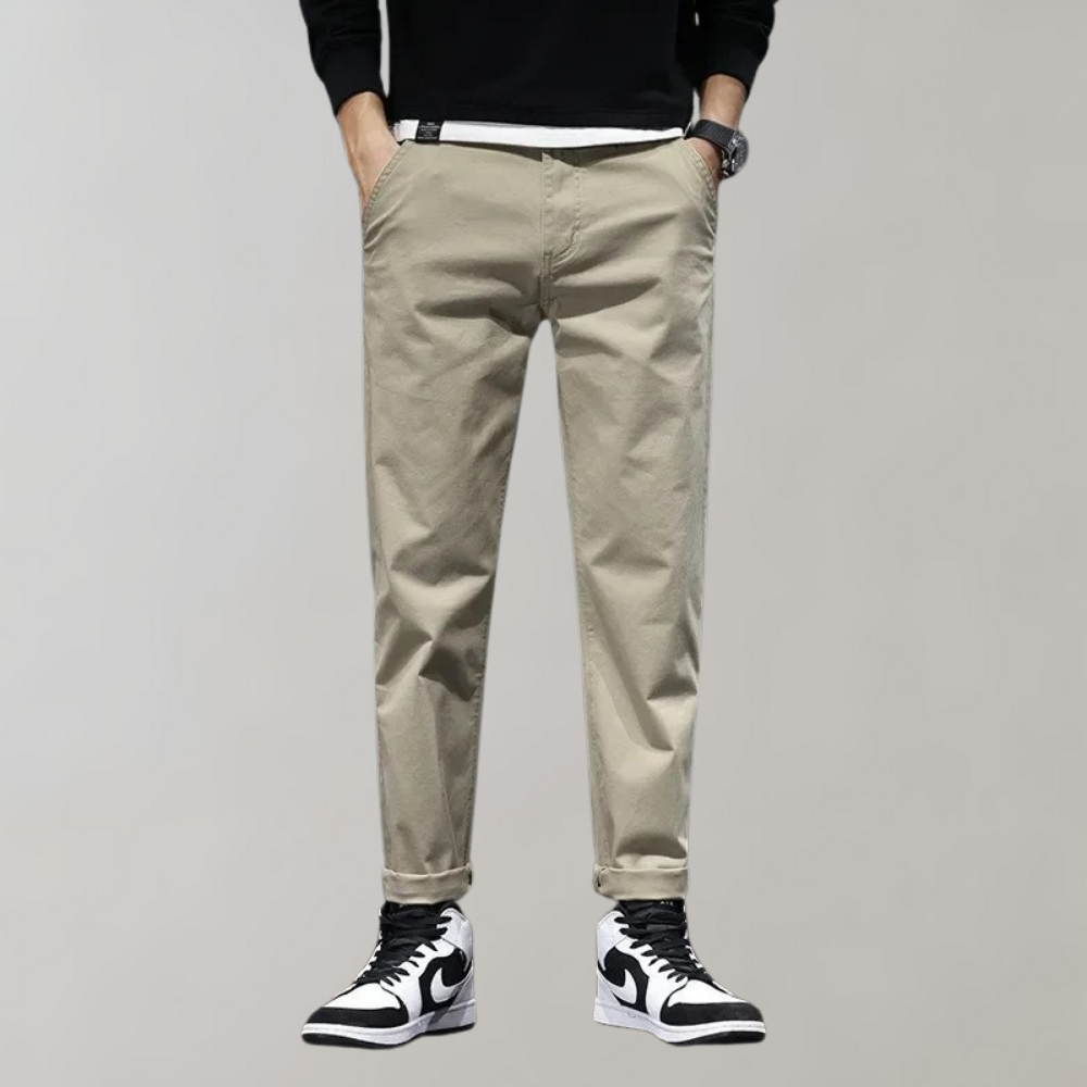 Modern elegant trousers for men with a tailored fit, versatile for formal and casual occasions, ideal for summer days.