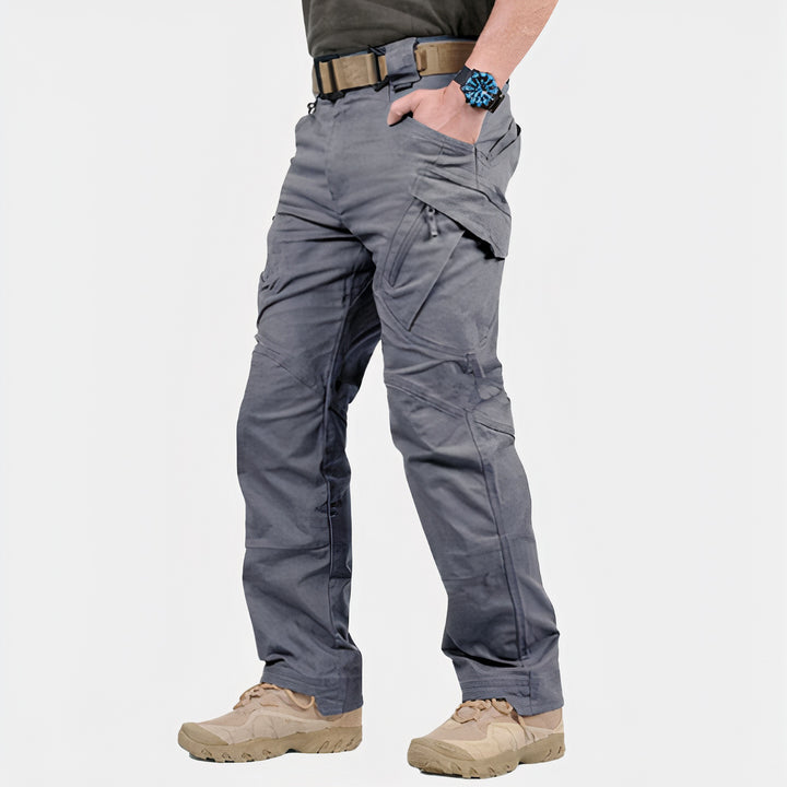 Waterproof cargo pants with multiple pockets, breathable fabric, and durable construction for outdoor adventures and summer days.