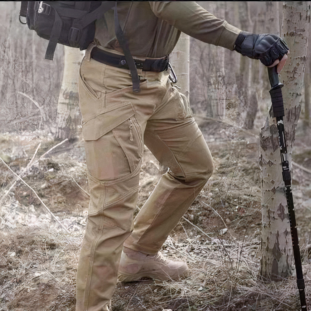 Waterproof cargo pants with multiple pockets, breathable fabric, and durable construction for outdoor adventures and summer days.