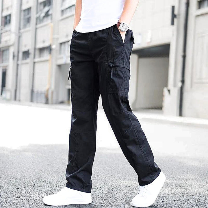 Premium men's cargo pants with multiple pockets, breathable fabric, and a relaxed yet stylish fit, perfect for summer days and casual outings.