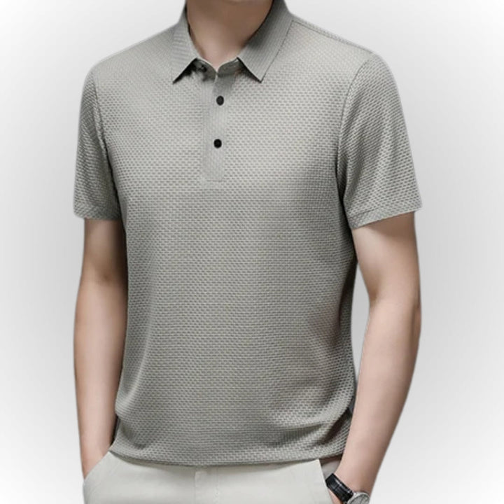 Premium elegant men's polo shirt with tailored fit and breathable fabric, ideal for summer days and versatile occasions.






