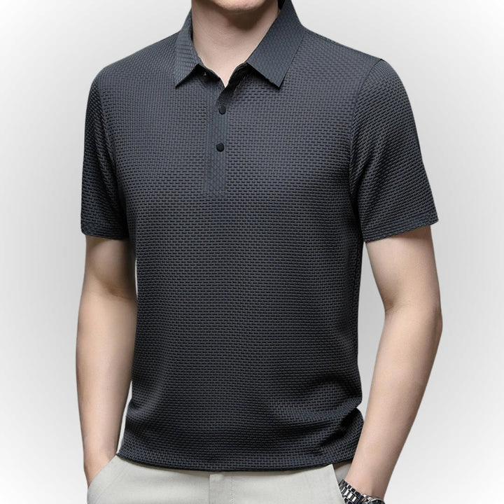 Premium elegant men's polo shirt with tailored fit and breathable fabric, ideal for summer days and versatile occasions.






