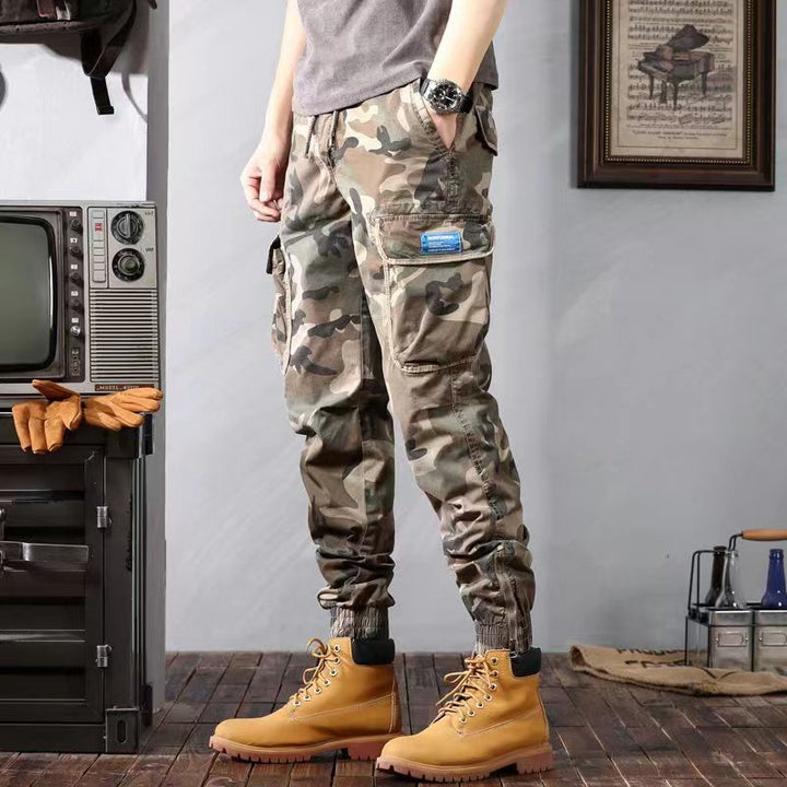 Premium tactical cargo pants with durable fabric, multiple pockets, and lightweight design, ideal for outdoor activities and summer wear.






