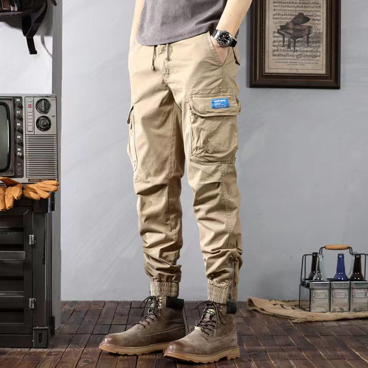 Premium tactical cargo pants with durable fabric, multiple pockets, and lightweight design, ideal for outdoor activities and summer wear.






