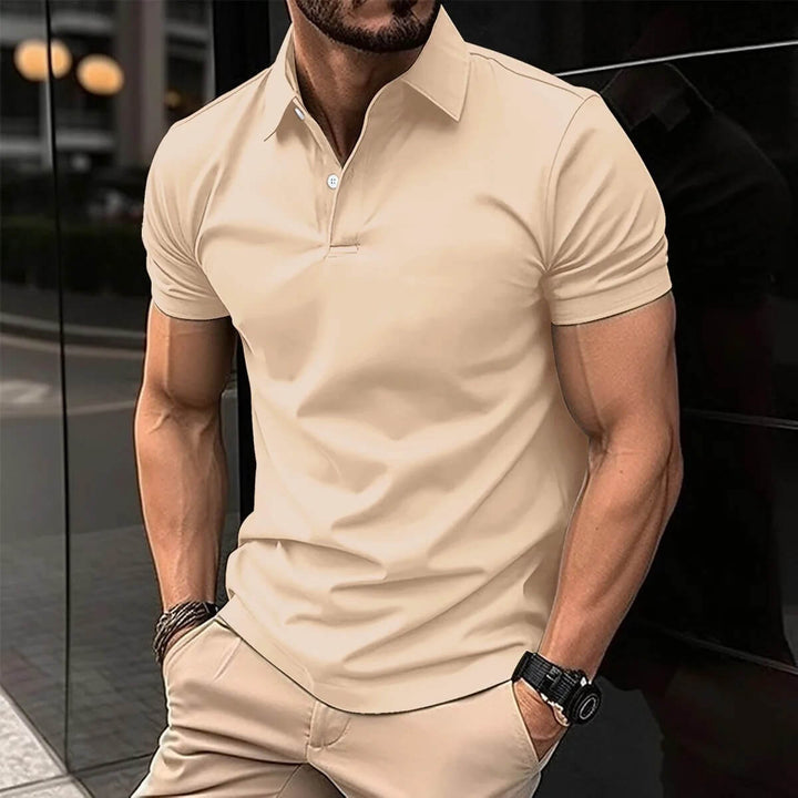 Sleek polo shirt for summer made from lightweight, breathable fabric, offering comfort and style for casual and semi-formal occasions.






