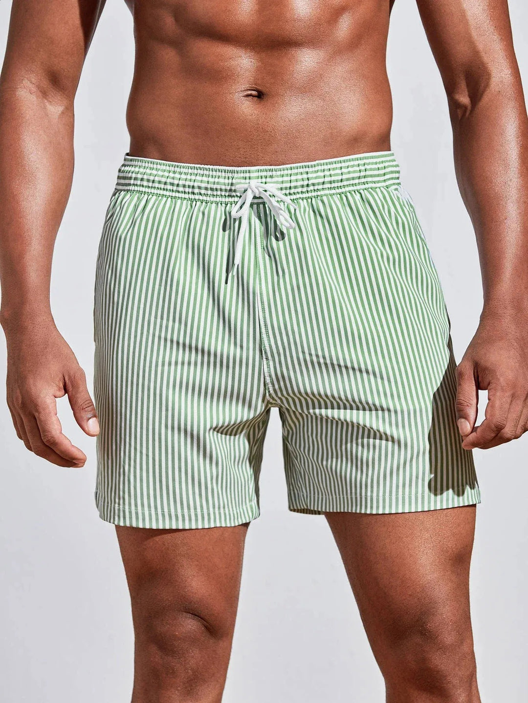  Soft men's swimming trunks with quick-drying fabric, lightweight comfort, and a secure fit, ideal for summer days at the beach or pool.
