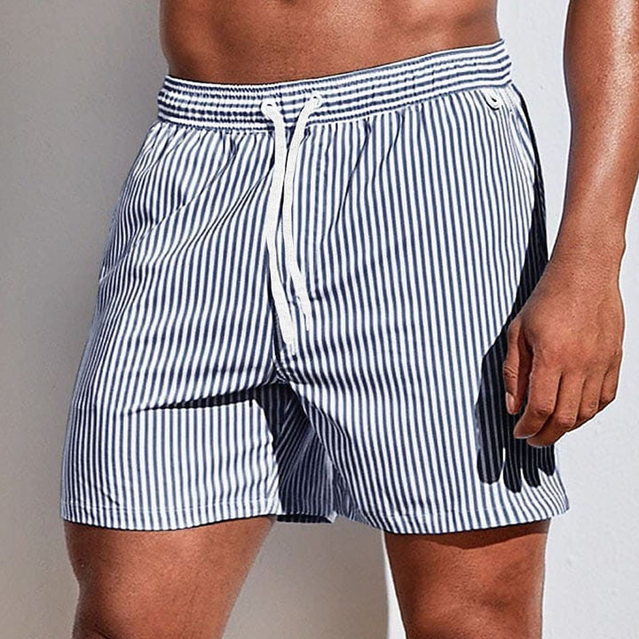  Soft men's swimming trunks with quick-drying fabric, lightweight comfort, and a secure fit, ideal for summer days at the beach or pool.






