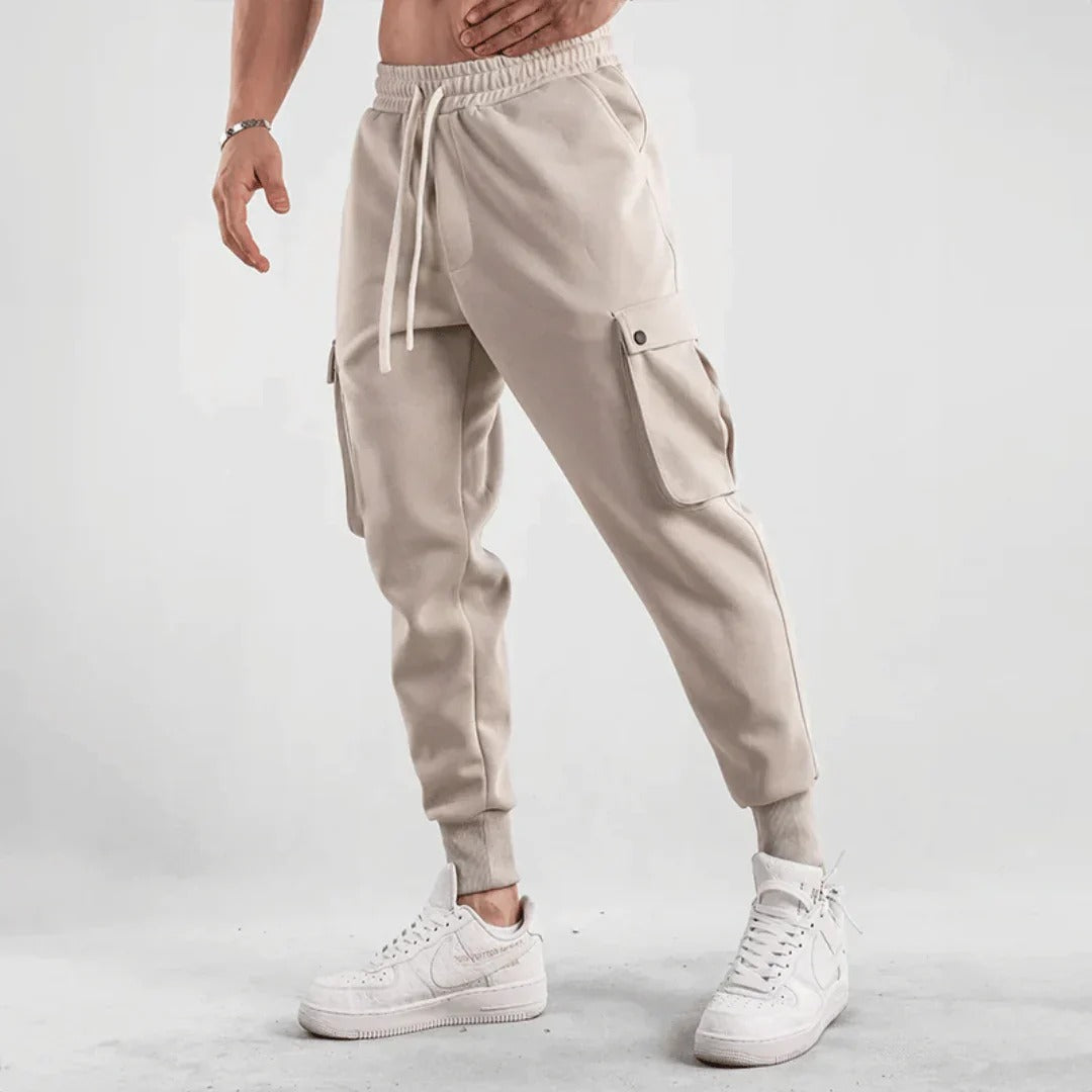 Stylish men's cargo joggers with breathable material, functional pockets, and a slim-fit design, perfect for summer days and casual outings.






