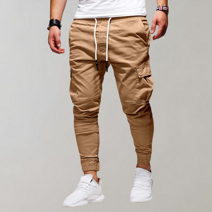  Stylish men's cargo joggers with breathable fabric, functional pockets, and a tailored fit, ideal for summer comfort and casual wear.