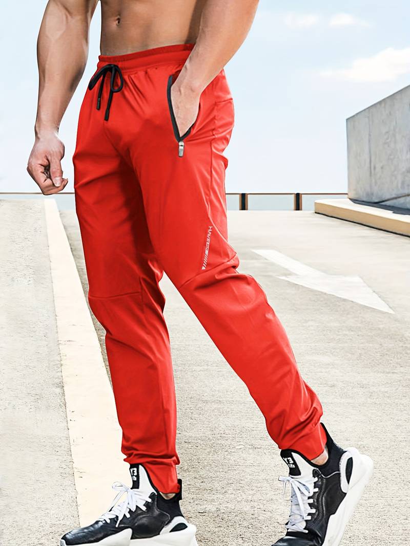 Trendy drawstring pants for men with a breathable lightweight fabric, adjustable waist, and relaxed fit, ideal for casual outings and summer days.