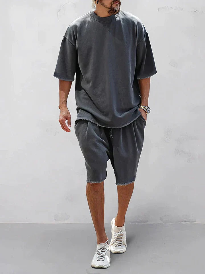 Trendy oversized shirt and shorts set, perfect for summer days, offering comfort and effortless style.