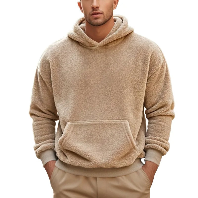 Warm men's hoodie with soft insulating fabric, breathable design, and a relaxed fit, ideal for autumn layering.







