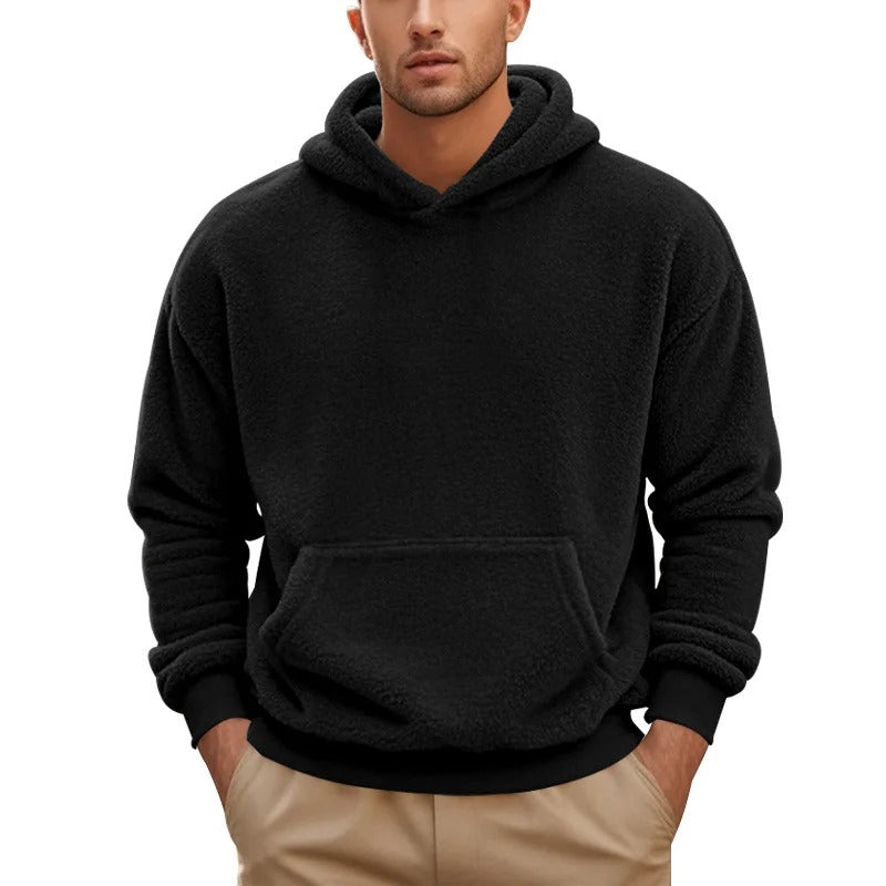 Warm men's hoodie with soft insulating fabric, breathable design, and a relaxed fit, ideal for autumn layering.







