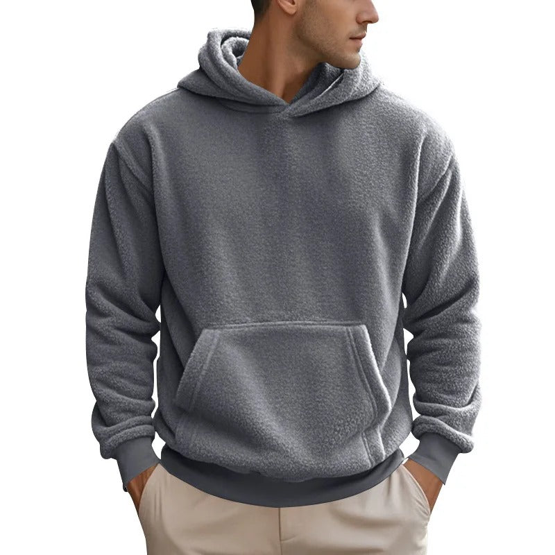 Warm men's hoodie with soft insulating fabric, breathable design, and a relaxed fit, ideal for autumn layering.







